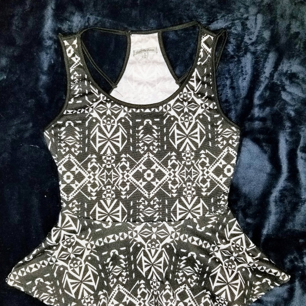 Size medium black with designs peplum blouse